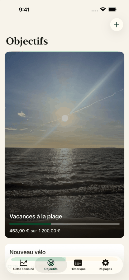 L'écran des objectifs, avec une photo de plage derrière l'objectif vacances à la plage à quatre cent cinquante-deux sur mille deux cents dollars.